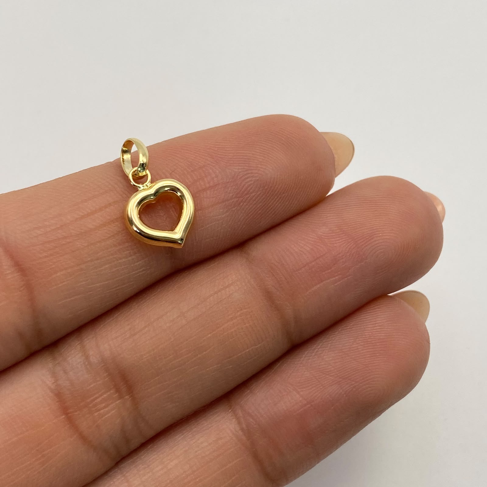 Dije Corazon Silueta Oro amarillo 18k 0,4 Gr / 8,6 mm / 1,6 Cm