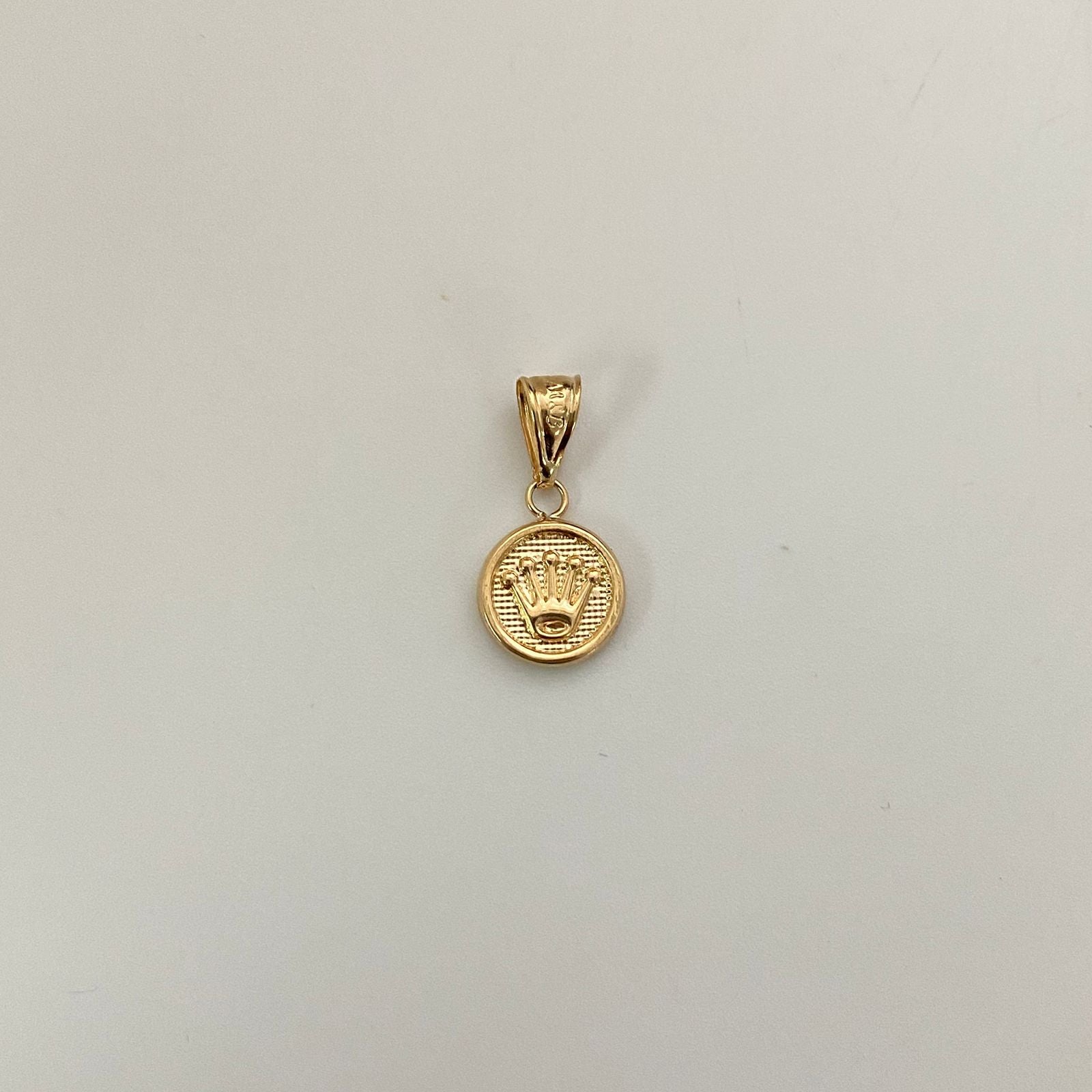 Dije Corona Rx Oro amarillo 18k 0,6 Gr / 10,1 mm / 1,9 Cm