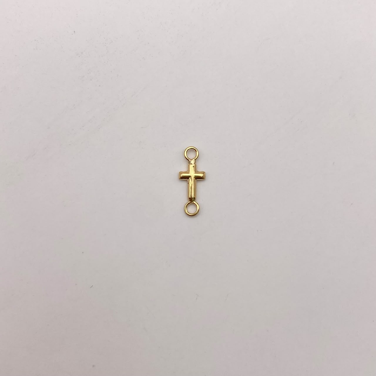 Herraje mini cruz lisa Oro amarillo 18k 0,2 Gr / 1,5 Cm