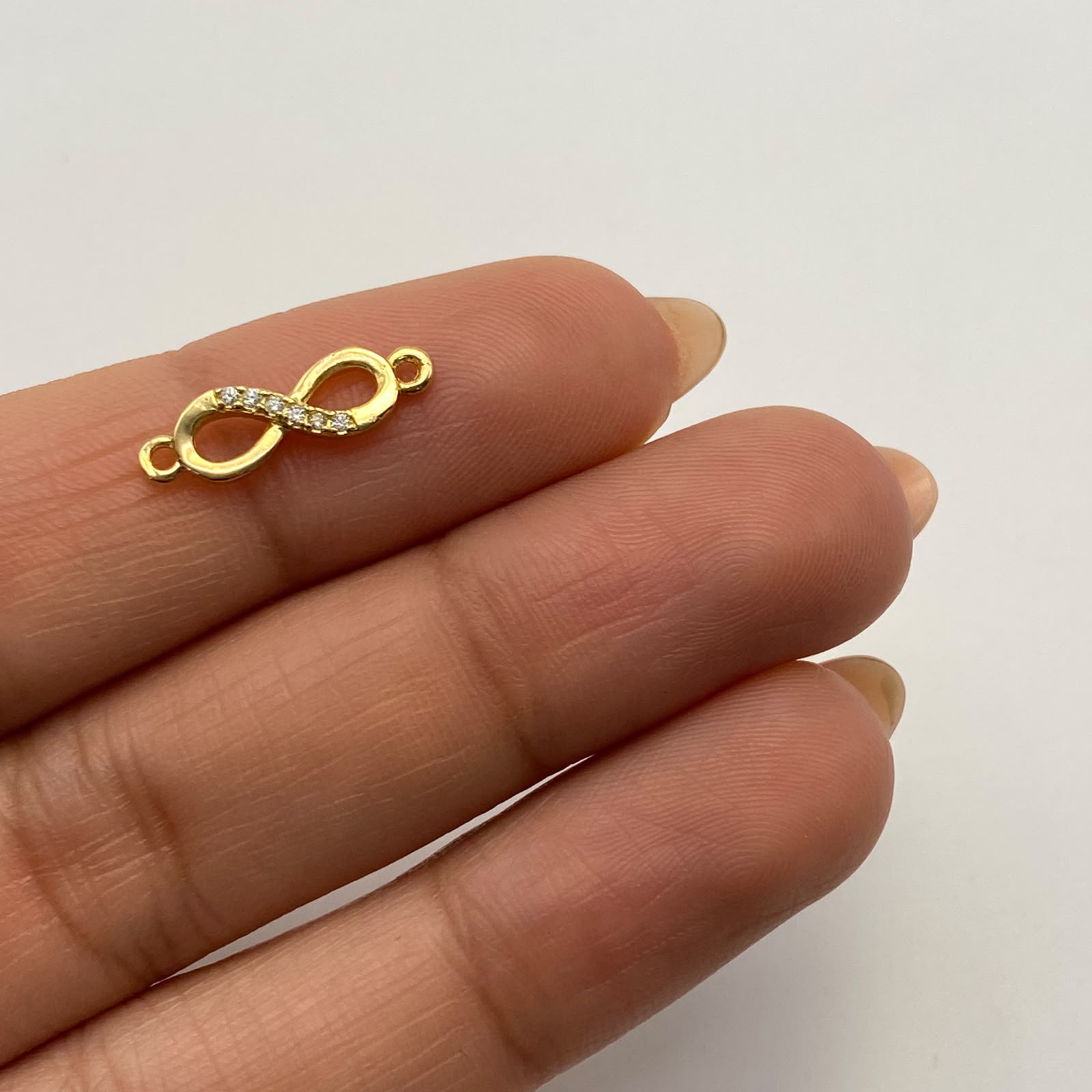 Herraje Infinito Casting Oro amarillo 18k 0,65 Gr / 1,6 Cm