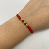 Pulsera tejida Bola 3mm hilo rojo Oro amarillo 18k 0,2 Gr