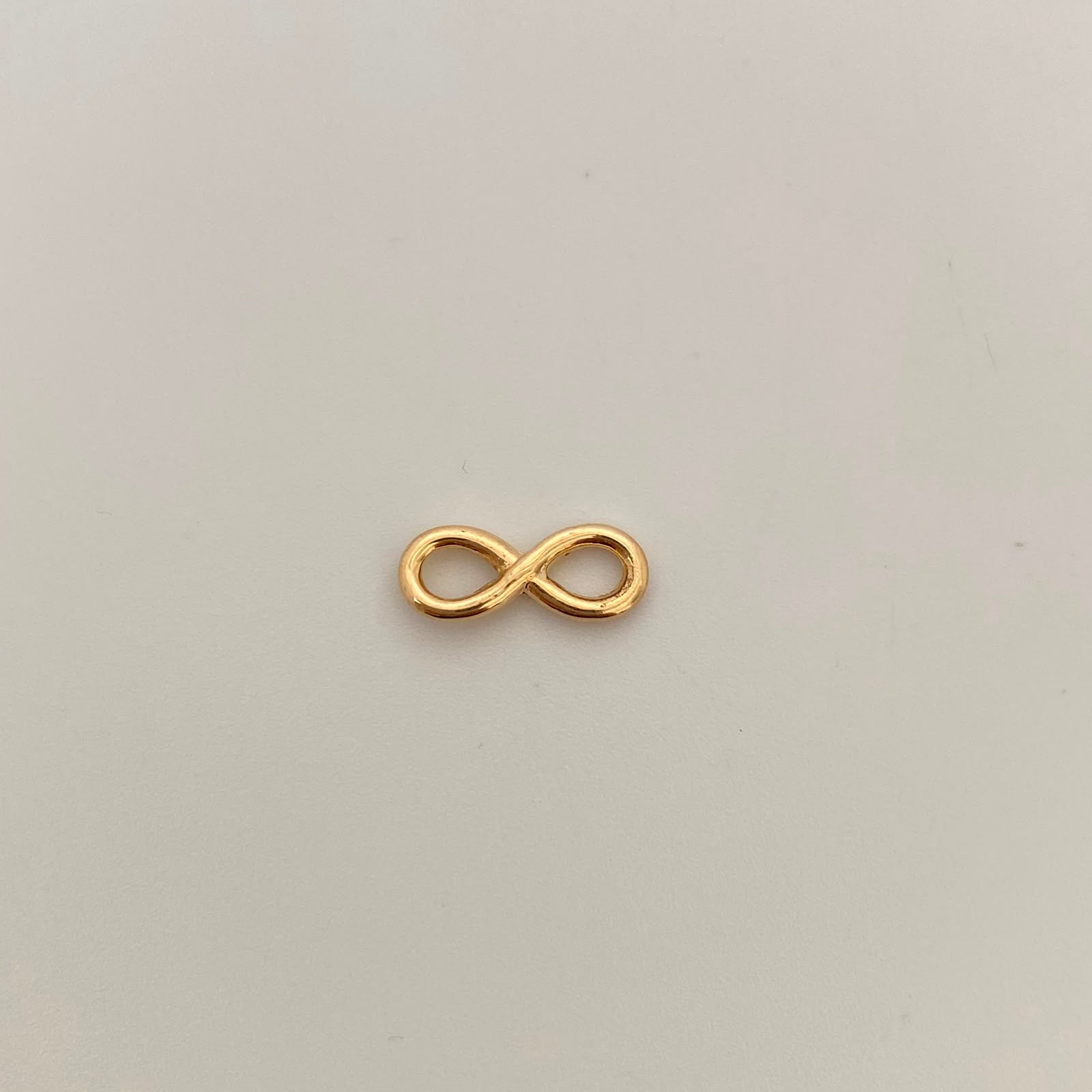 Herraje Infinito Oro amarillo 18k 0,45 Gr / 1,5 Cm