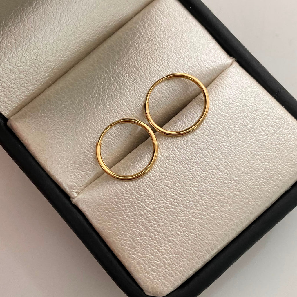 Candonga imperdible lisa  Oro amarillo 18k 0,6 Gr / 1,2 Cm