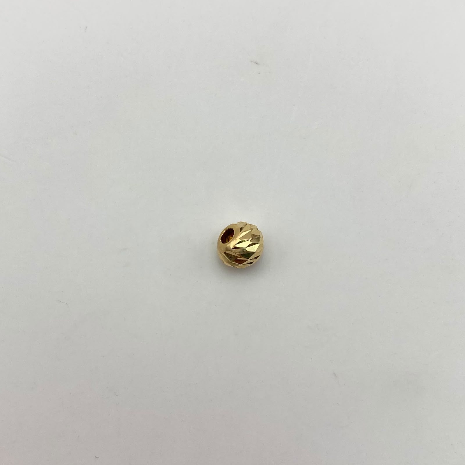 Bola Diamantada 6mm Oro amarillo 18k 0,15 Gr