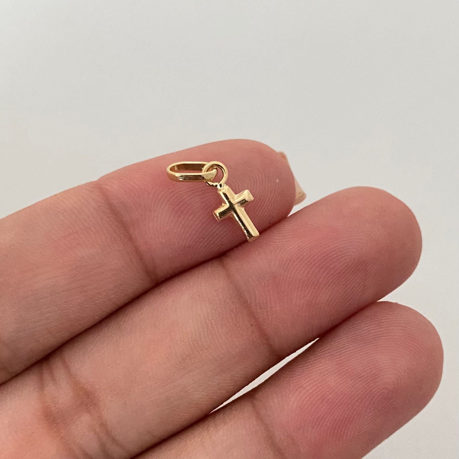 Dije cruz lisa mini Oro amarillo 18k 0,30 Gr / 1,5 Cm