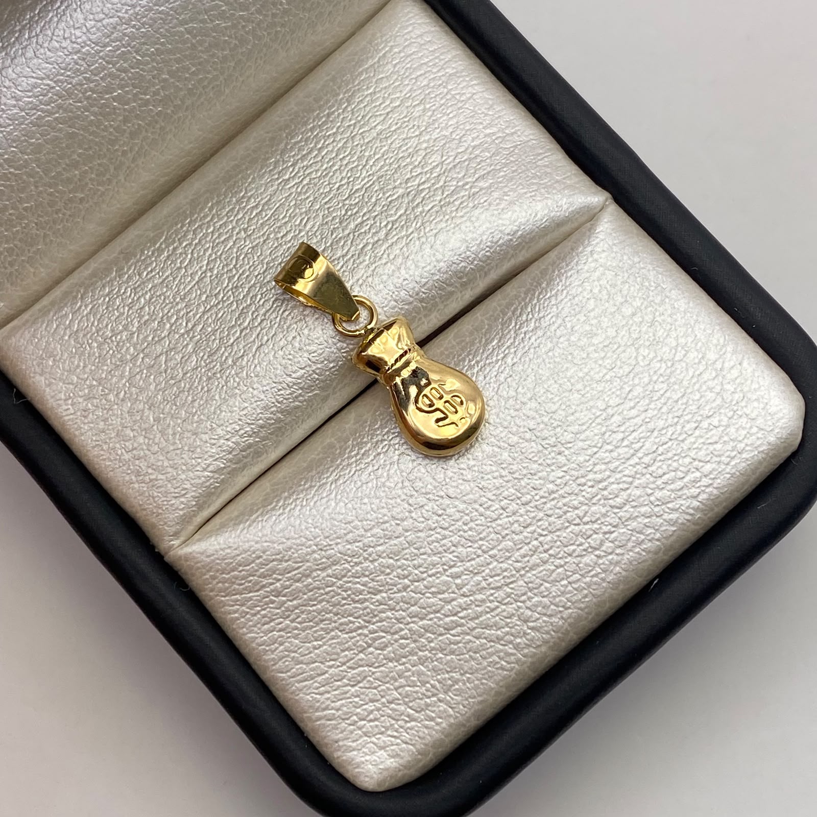 Dije Bolsa de valores Oro amarillo 18k 0,53 Gr / 6,5 mm / 2 Cm