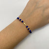 Pulsera tejida Herraje cruz lisa bolas diamantadas 4mm hilo azul Oro amarillo 18k 0,45 Gr