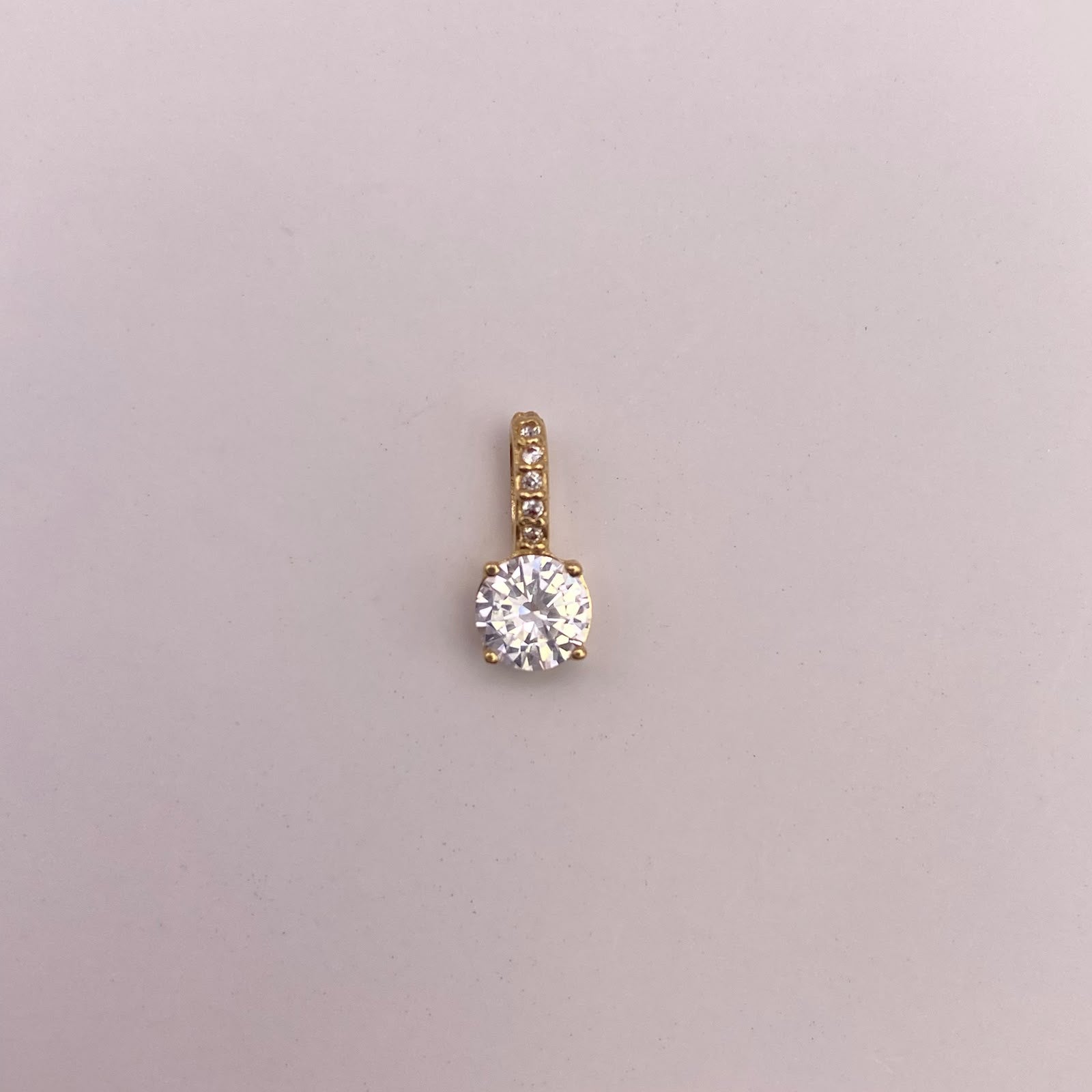 Dije redondo circón blanco Oro amarillo 18k 0,92 Gr / 5,65 mm / 1 Cm