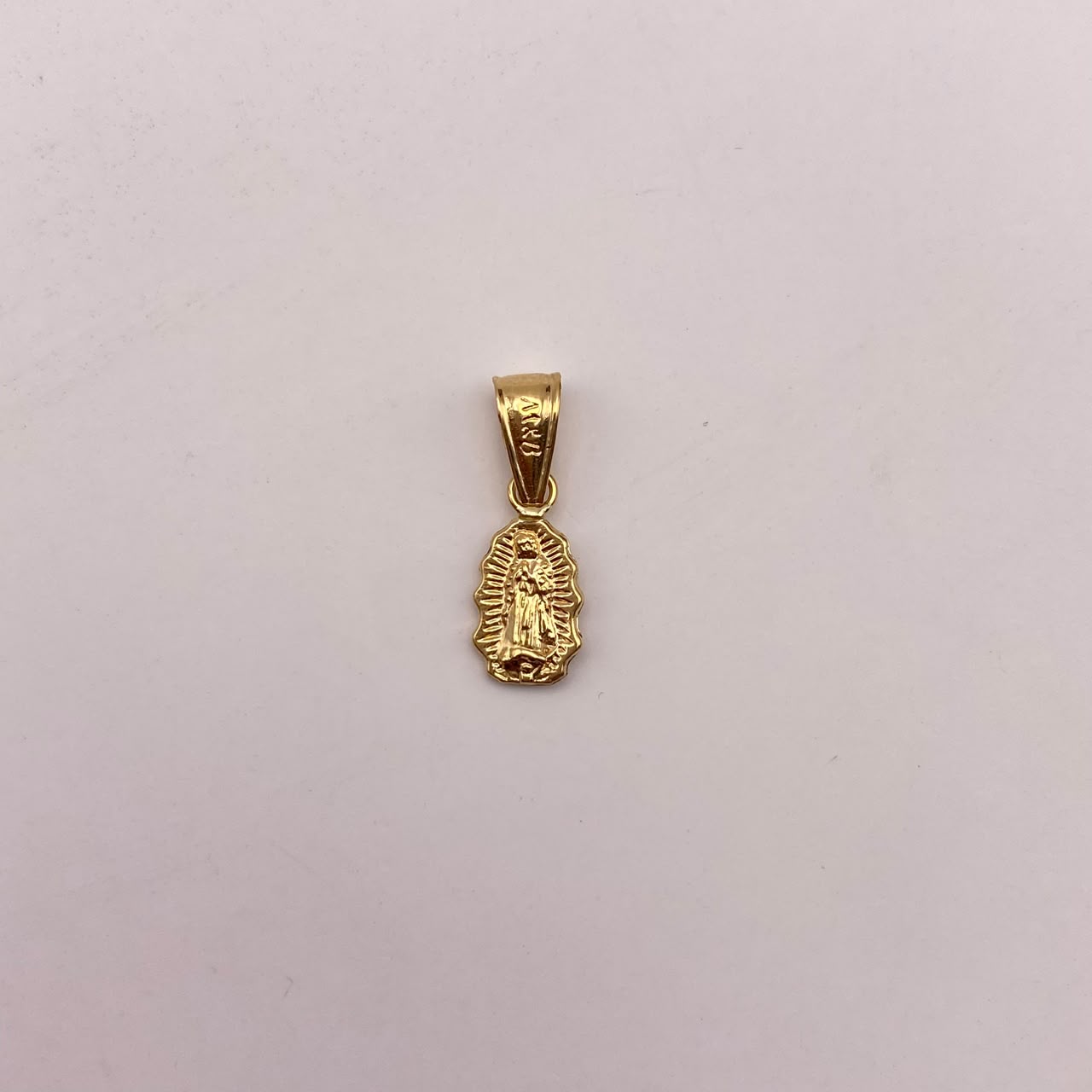 Dije virgen guadalupe Oro amarillo 18k 0,45 Gr / 6,8 mm / 2 Cm