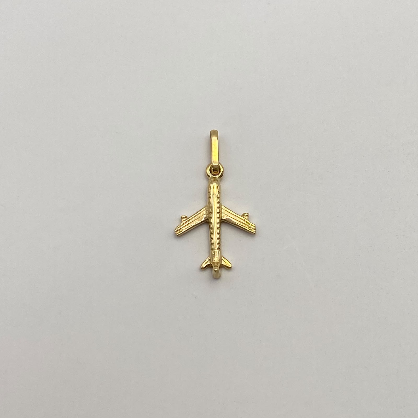 Dije Avion Oro amarillo 18k 1,35 Gr / 13,3 mm / 2,5 Cm
