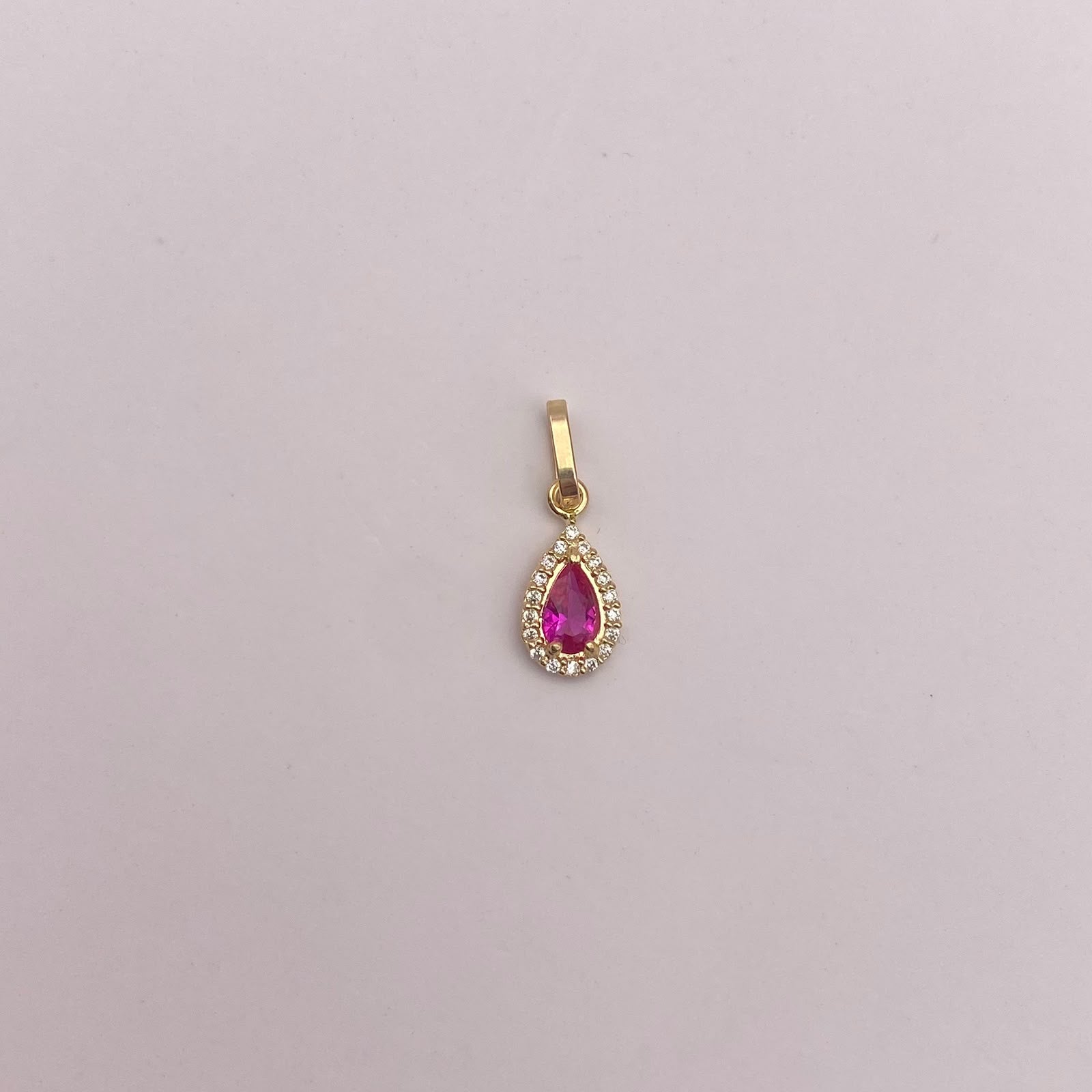Dije Gota circon fucsia y blancos Oro amarillo 18k 0,4 Gr / 5,5 mm / 1,5 Cm