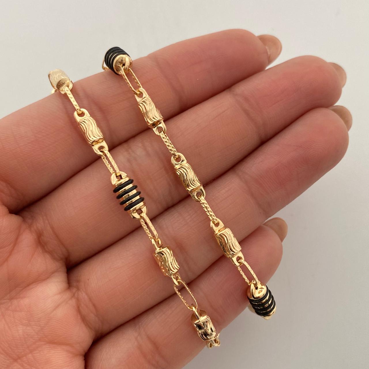 Cadena rustica con barriles diamantados y cauchos negros  Oro amarillo 18k 12,75 Gr / 4,4 mm / 60 Cm Broche 0,60
