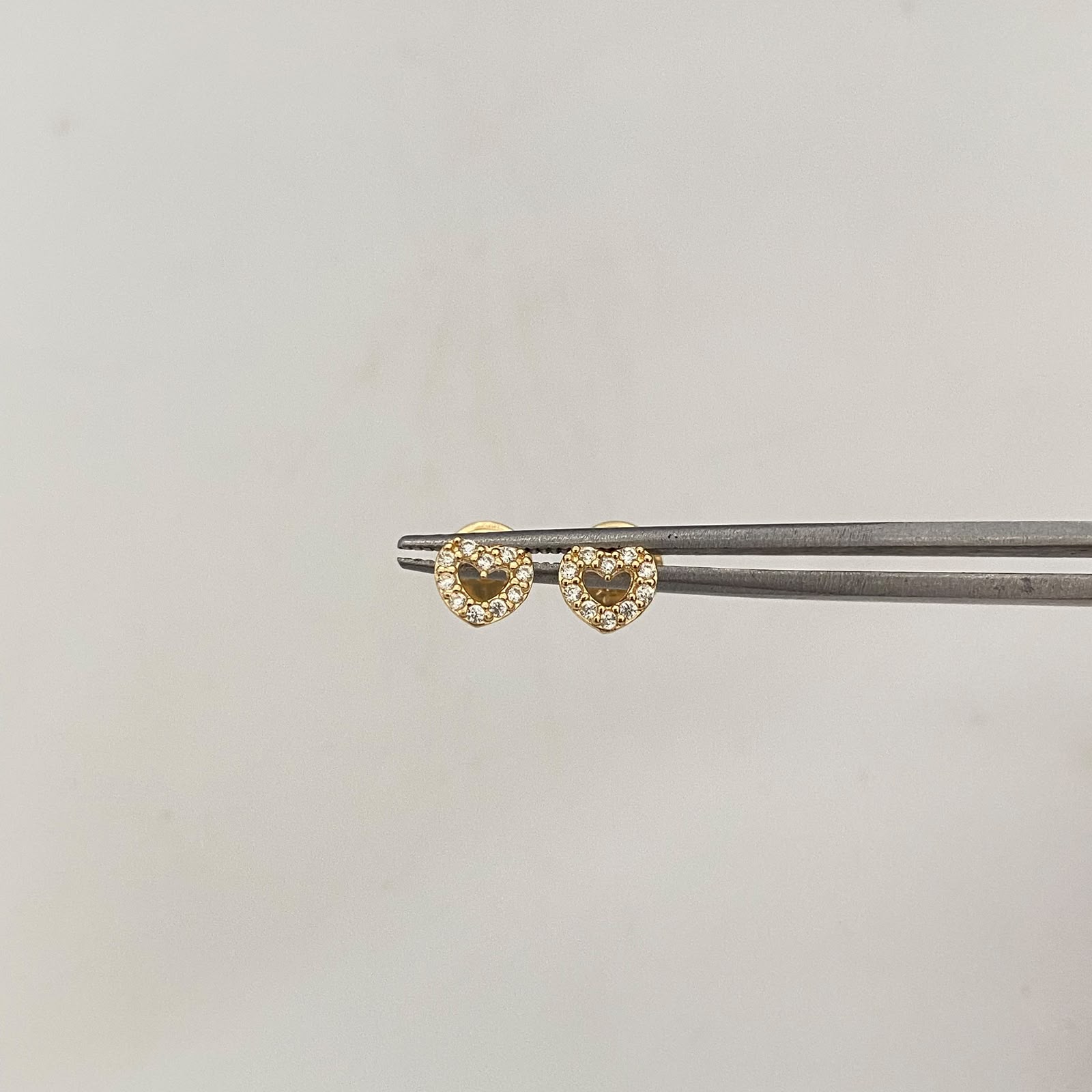 Topos Corazon Silueta Casting Oro amarillo 18k 0,7 Gr / 5,6 mm