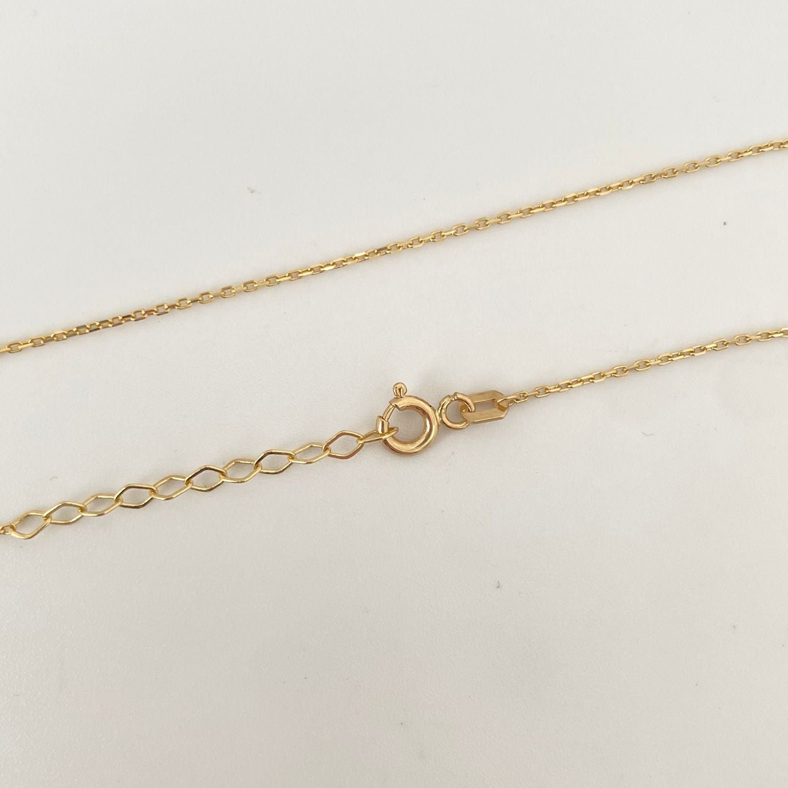 Cadena It flor fondo negro centro circon Oro amarillo 18k +4 / 2,75 Gr / 0,9 mm / 50 Cm