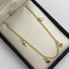 Tobillera aro seguido dijes Oro amarillo 18k 3,55 Gr / 2,25 mm / 25 Cm Broche 0,40