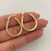 Candonga ovalada rayada  Oro amarillo 18k 2,15 Gr / 2,5 Cm