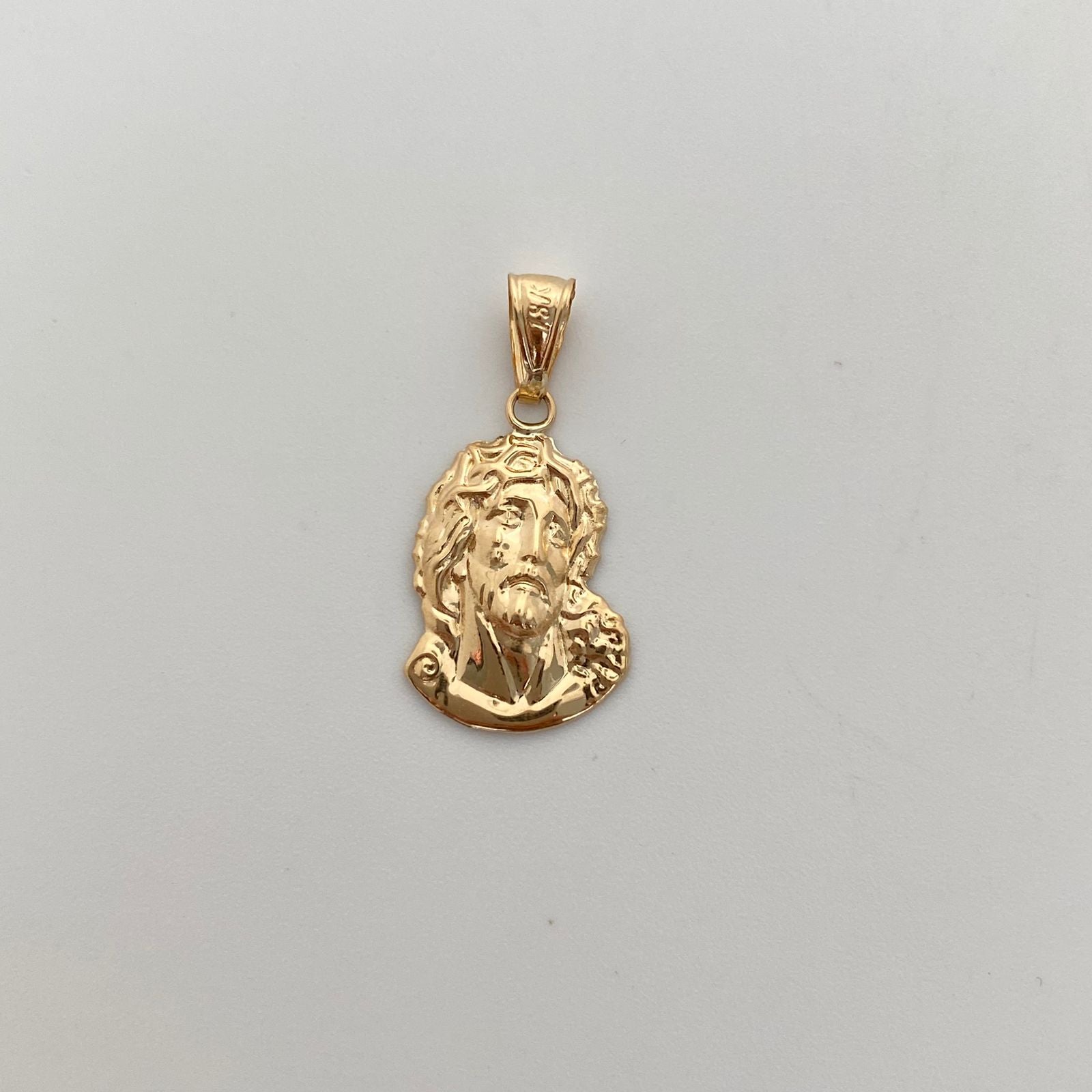 Dije Rostro Oro amarillo 18k 1,15 Gr / 13,5 mm / 2,6 Cm