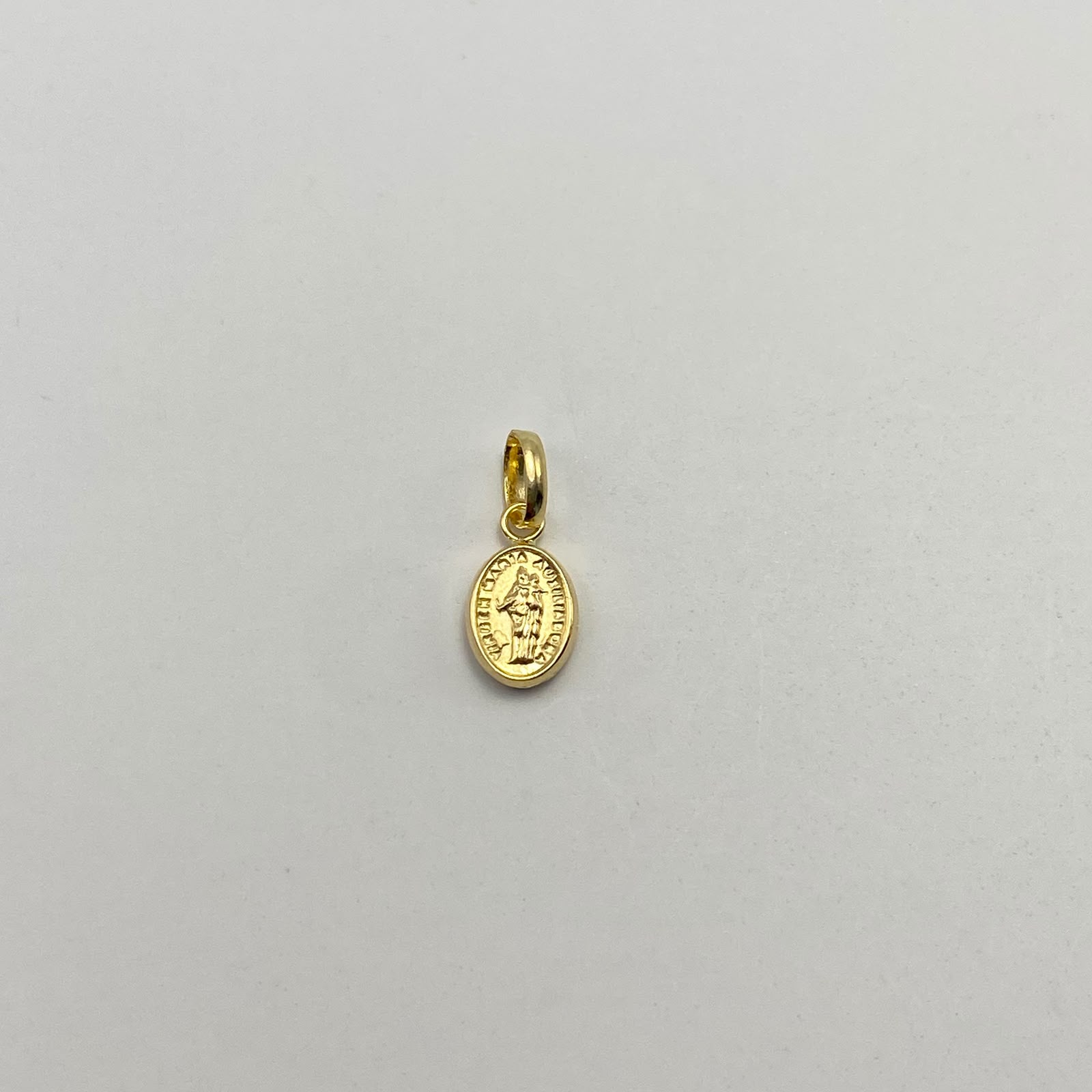 Dije Maria Auxiliadora Oro amarillo 18k 0,35 Gr / 6,3 mm / 1,4 Cm