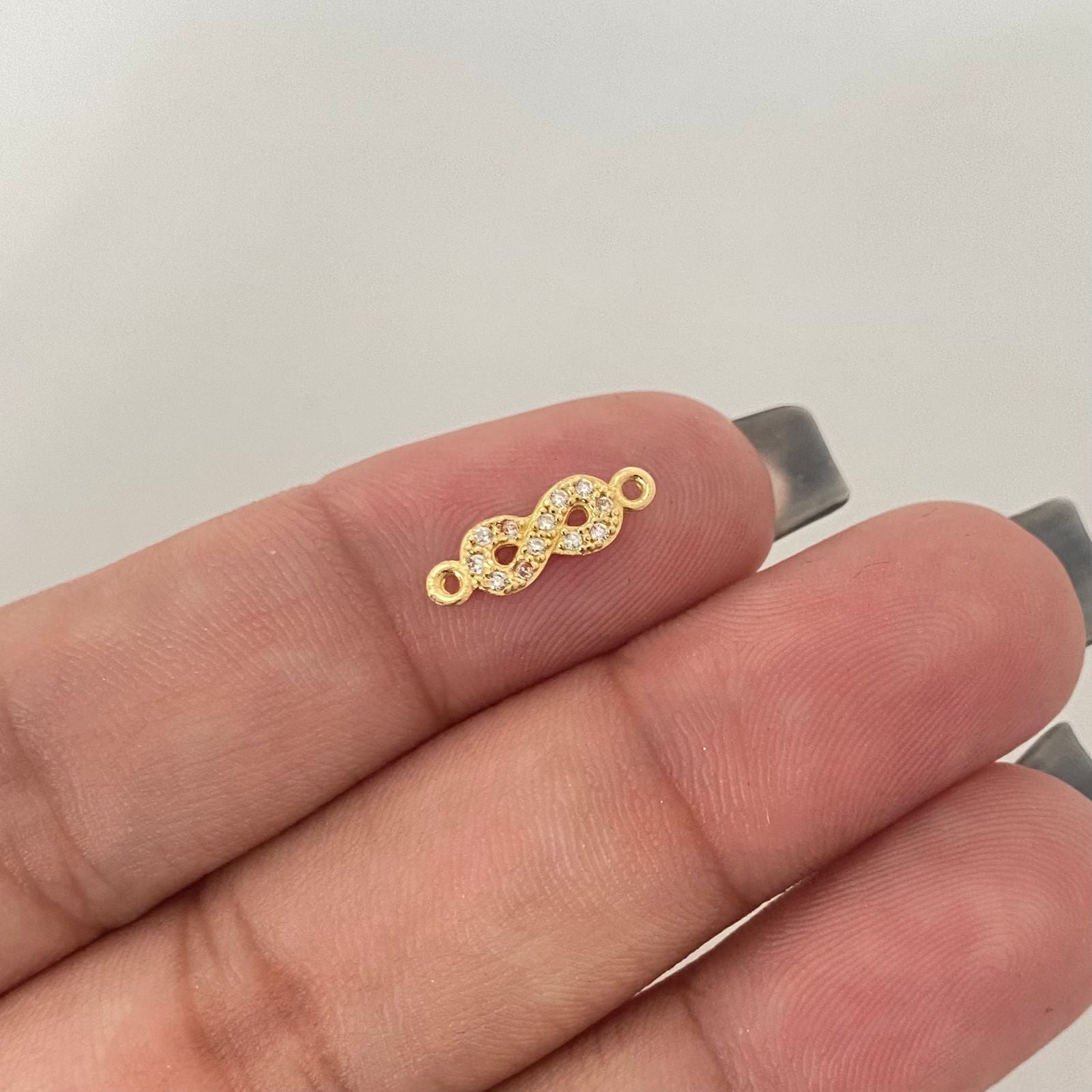 Herraje infinito mini casting Oro amarillo 18k 0,35 Gr / 1,3 Cm