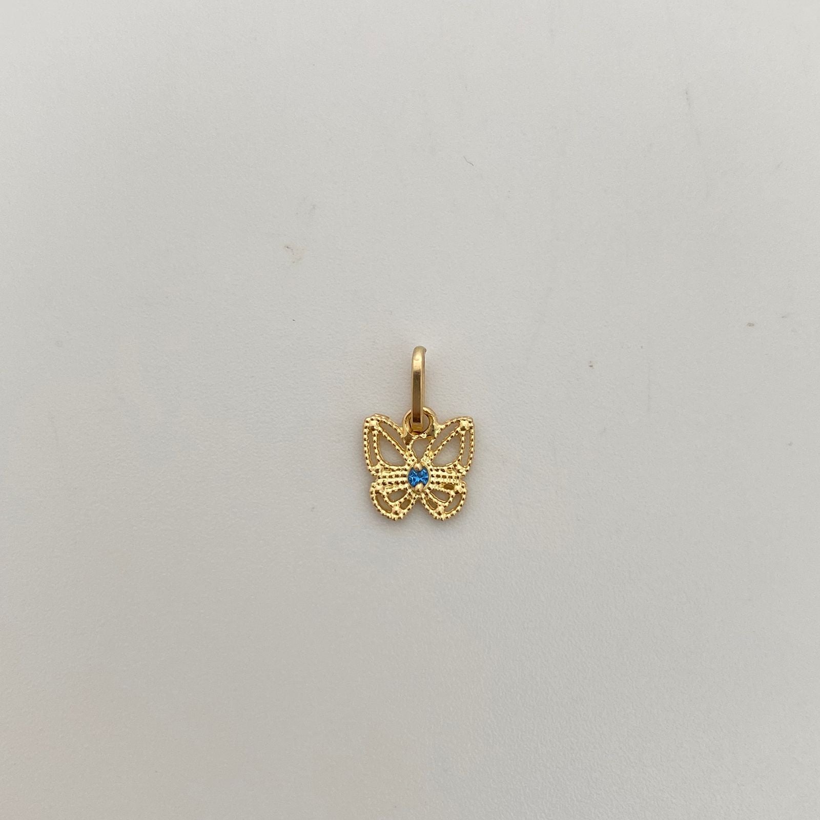 Dije Mariposa circon azul Oro amarillo 18k 0,5 Gr / 8,0 mm / 1,3 Cm