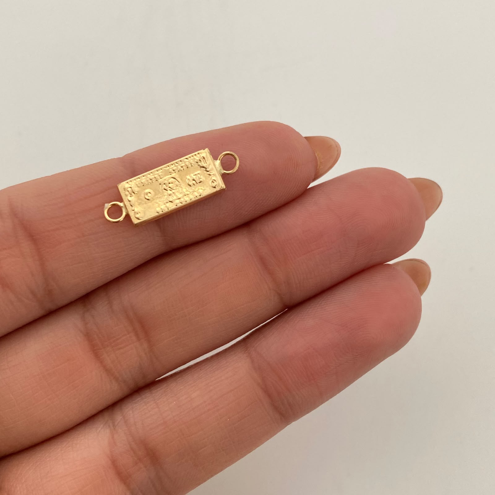 Herraje Dolar Oro amarillo 18k 0,55 Gr / 2 Cm