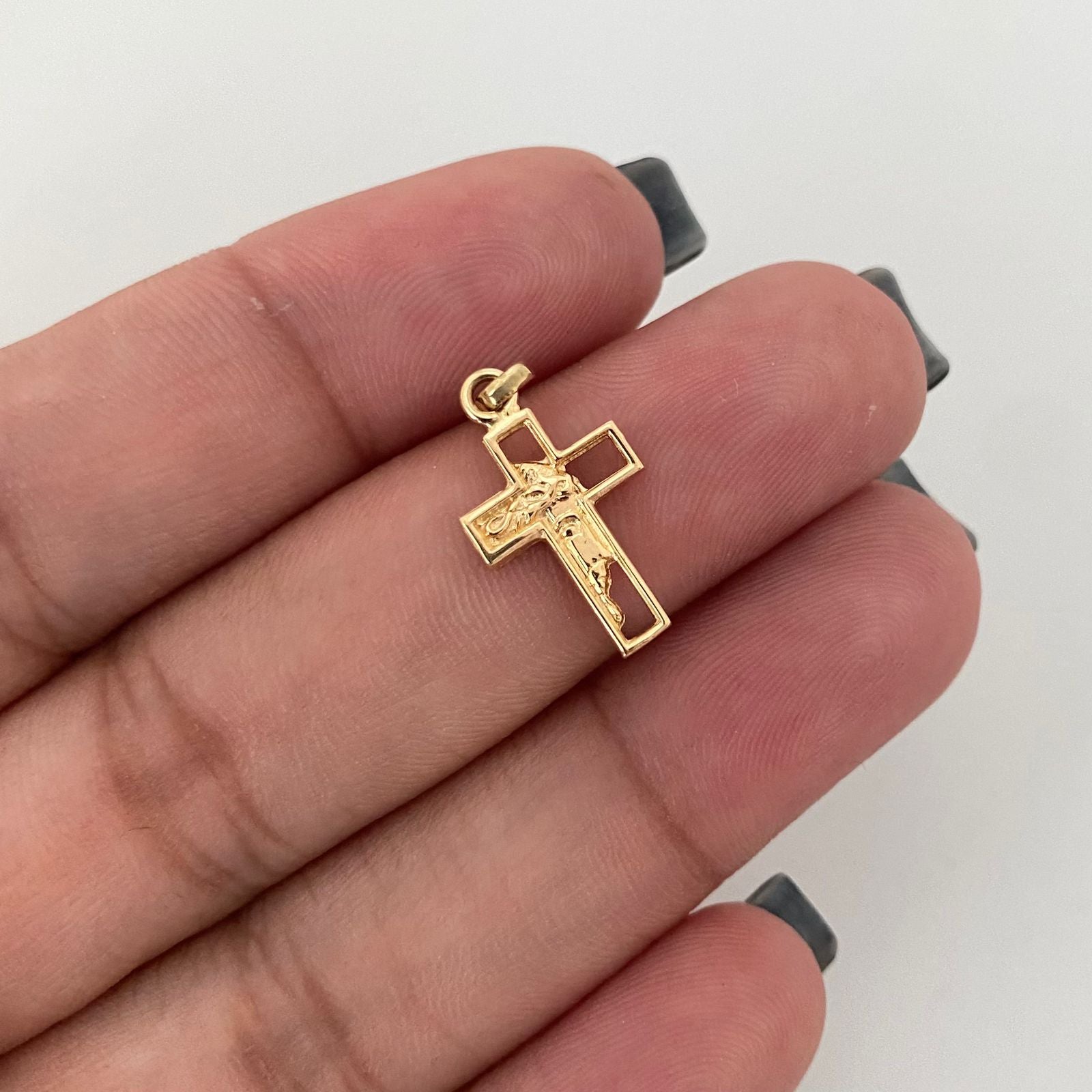 Dije cruz silueta cristo Oro amarillo 18k 1,10 Gr / 2,2 Cm