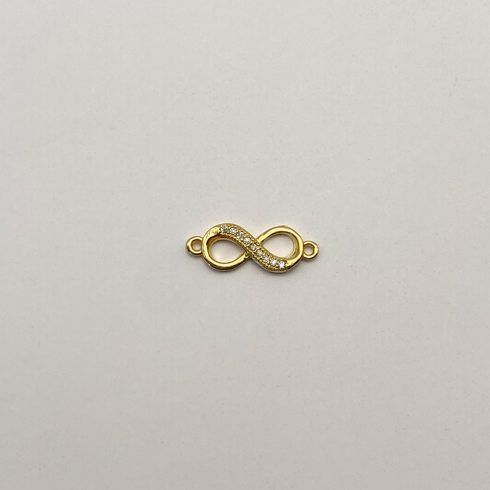 Herraje Infinito casting Oro amarillo 18k 1,15 Gr / 2,3 Cm