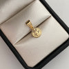 Dije San benito Oro amarillo 18k 0,45 Gr / 8,3 mm / 1,5 Cm