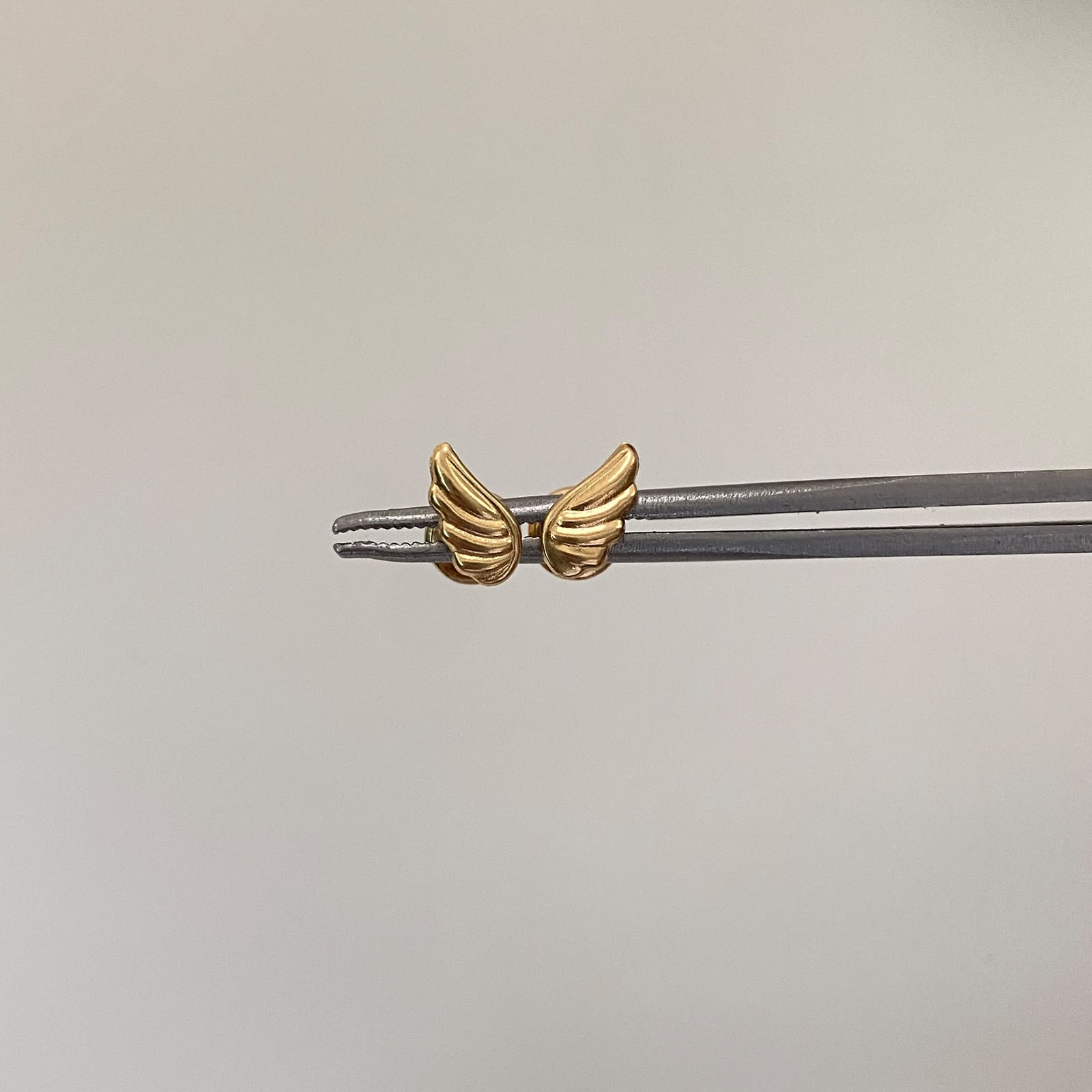 Topos ala lisa  Oro amarillo 18k 0,5 Gr / 7 mm