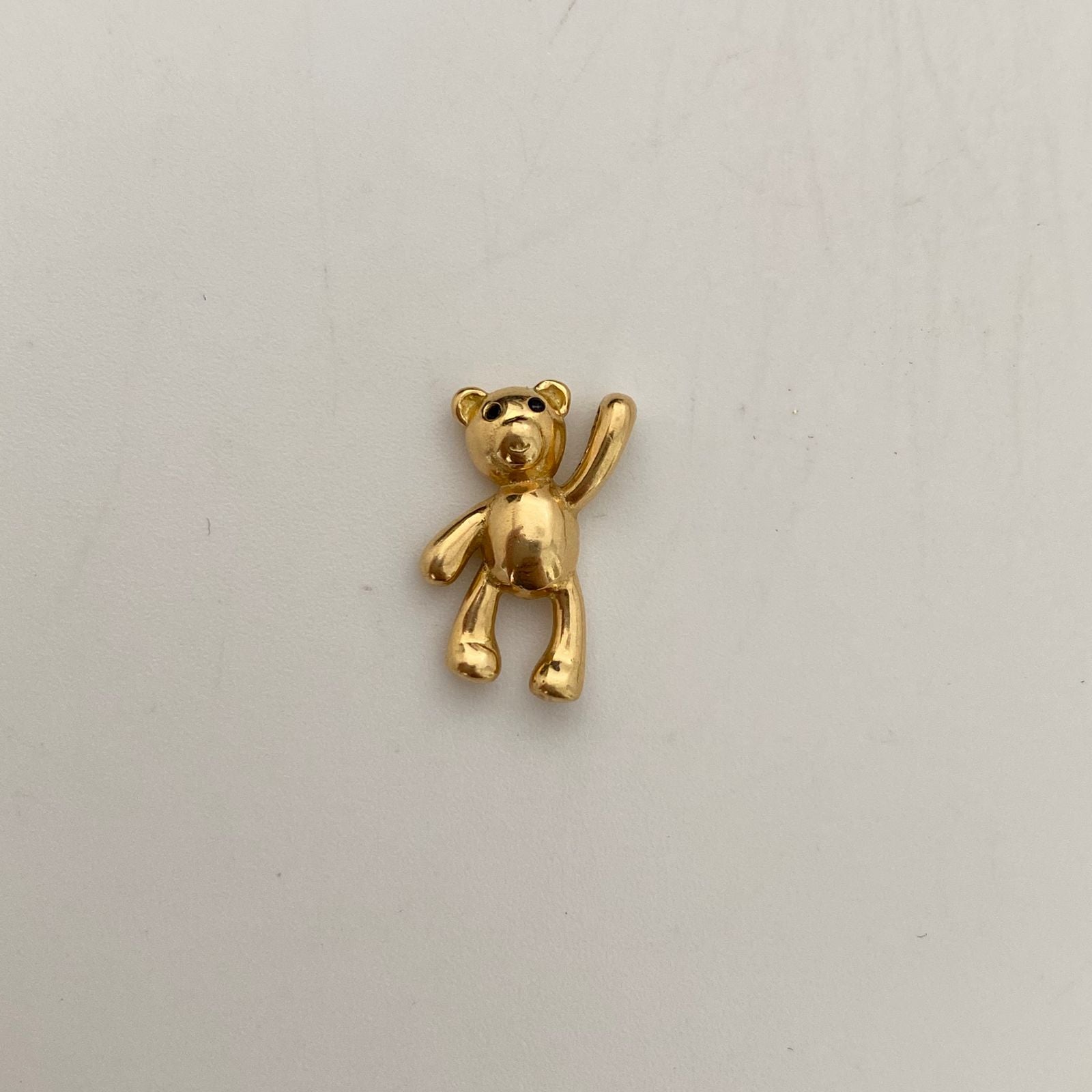 Dije oso mano alzada Oro amarillo  2,45 Gr / 1,5 Cm