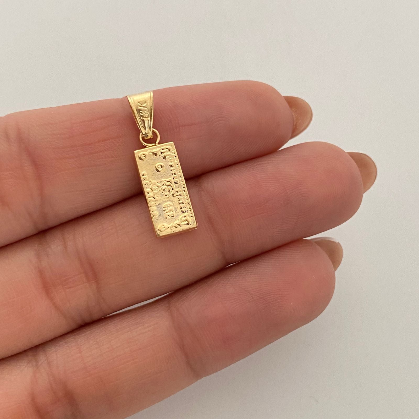 Dije dolar  Oro amarillo 18k 0,65 Gr / 6,58 mm / 2,2 Cm
