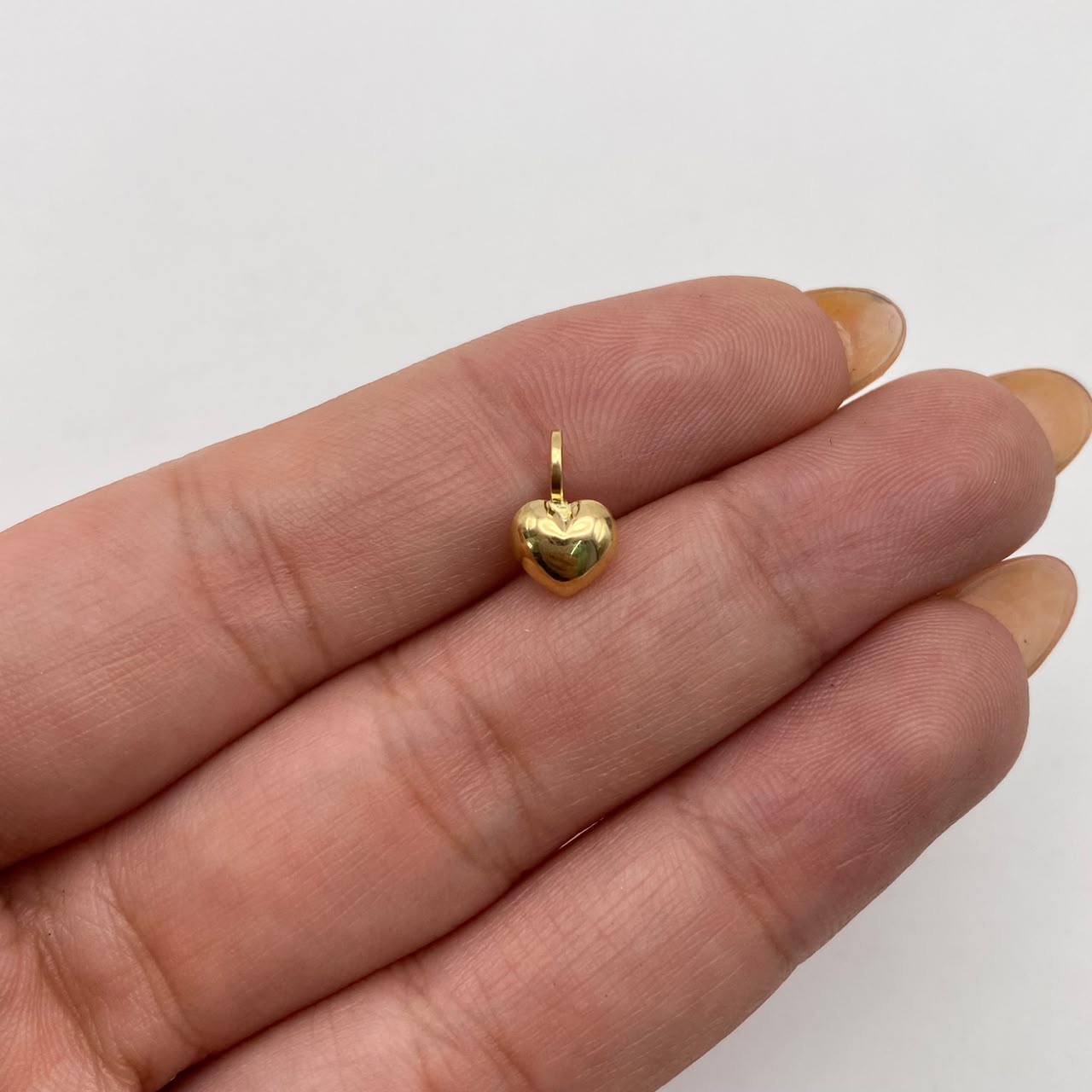 Dije corazon inflado Oro amarillo 18k 0,3 Gr / 6,5 mm / 1 Cm