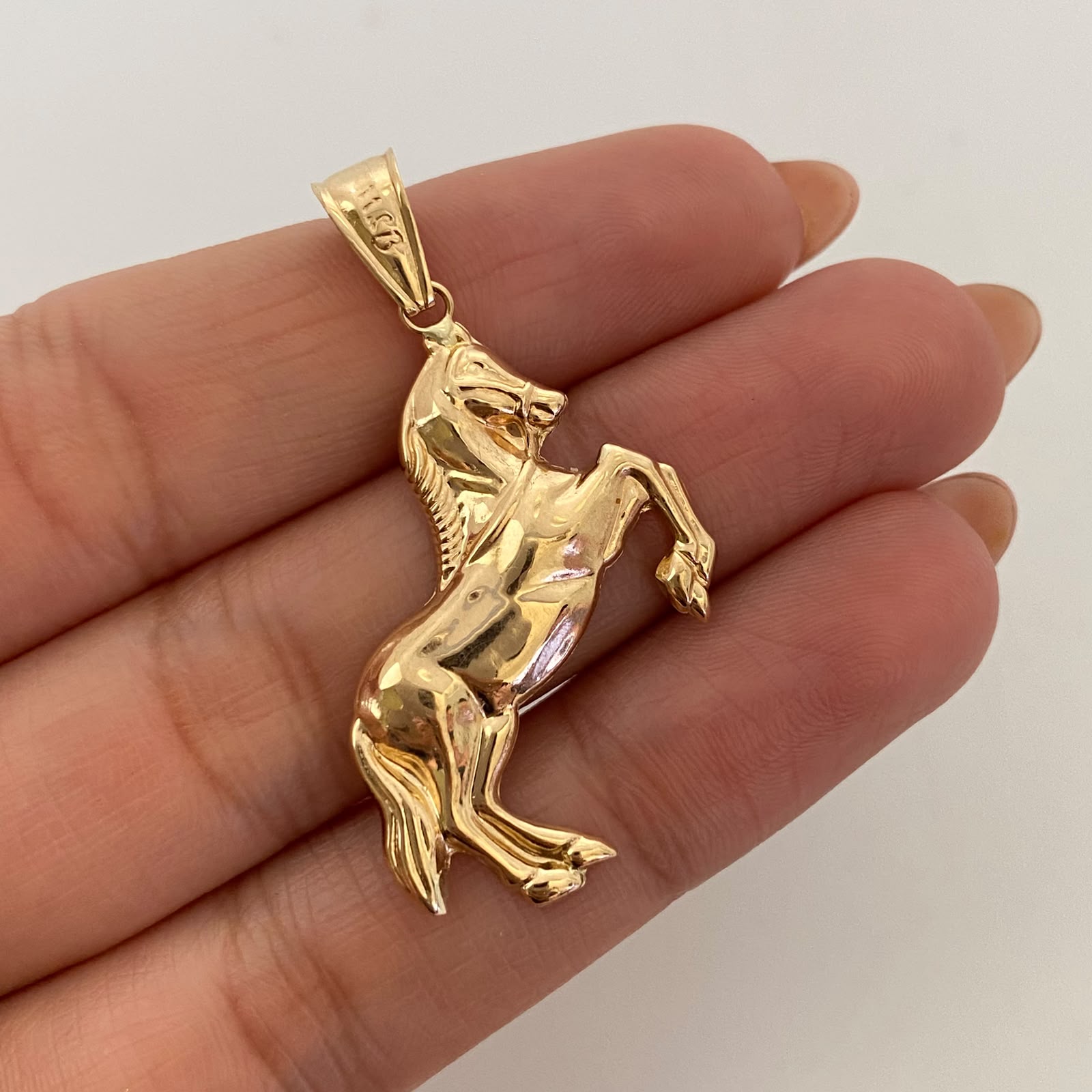 Dije Caballo Oro amarillo 18k 18,5 Gr / 27,3 mm / 4,2 Cm