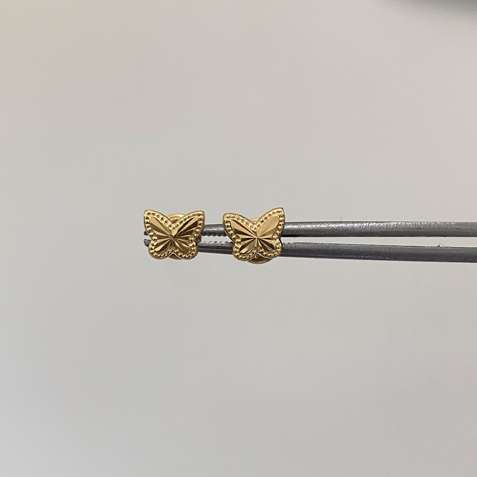 Topos mariposa diamantada mediana  Oro amarillo 18k 0,45 Gr / 7 mm