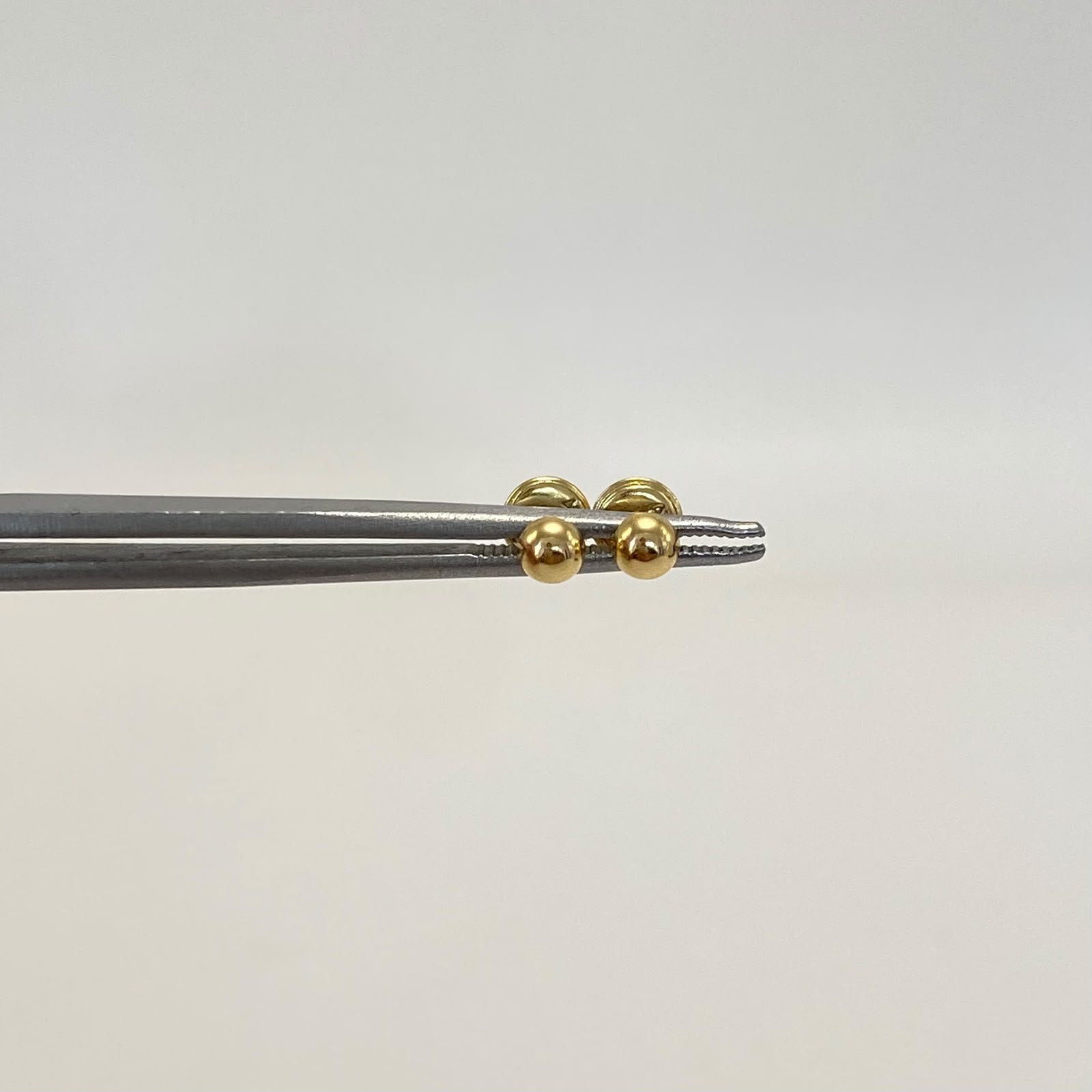 Topos media bola 4mm Oro amarillo 18k 0,45 Gr