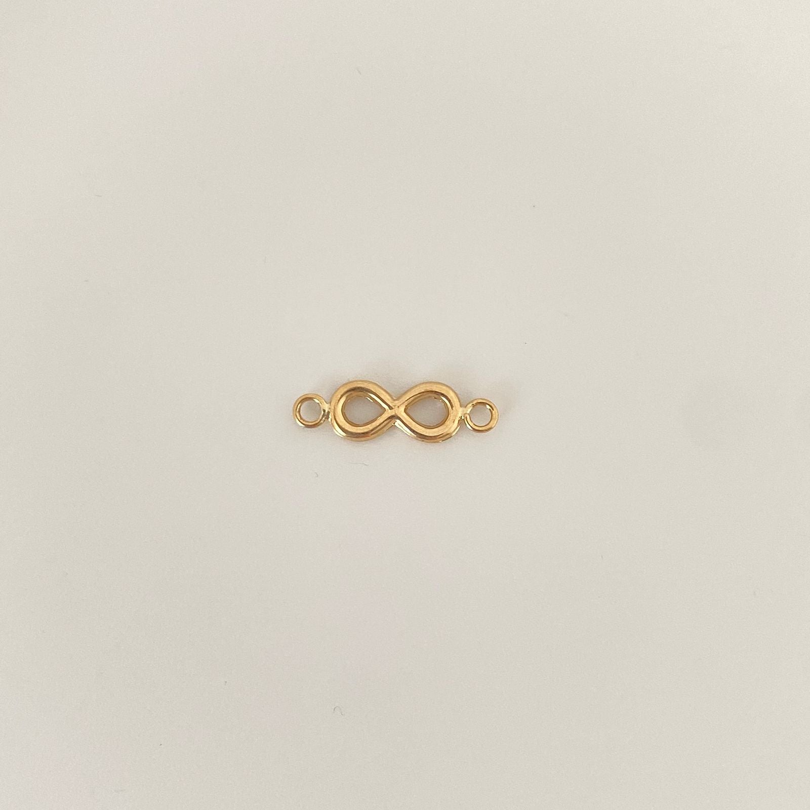 Herraje infinito liso Oro amarillo 18k 0,5 Gr / 1,9 Cm
