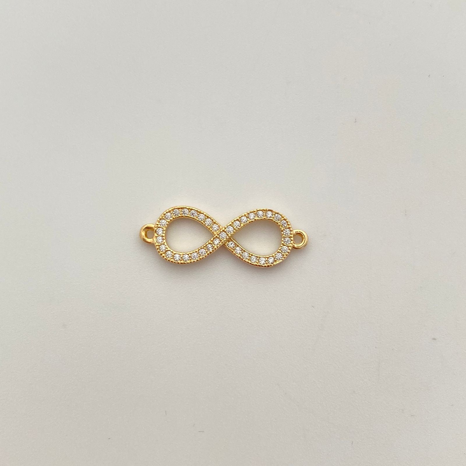 Herraje infinito con circones blancos  Oro amarillo 18k 1,25 Gr / 2 Cm