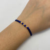 Pulsera tejida Bola 3mm hilo azul Oro amarillo 18k 0,2 Gr