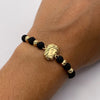 Pulsera tejida Rostro cristo bolas diamantadas 5mm  Oro amarillo 18k 1,1 Gr