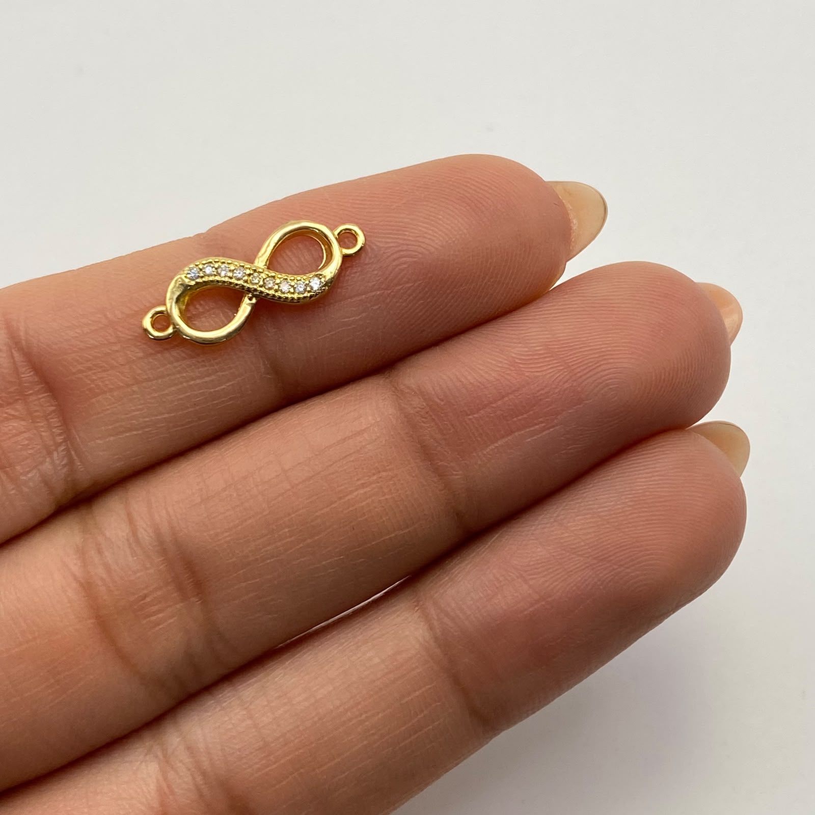 Herraje Infinito casting Oro amarillo 18k 1,2 Gr / 2,3 Cm