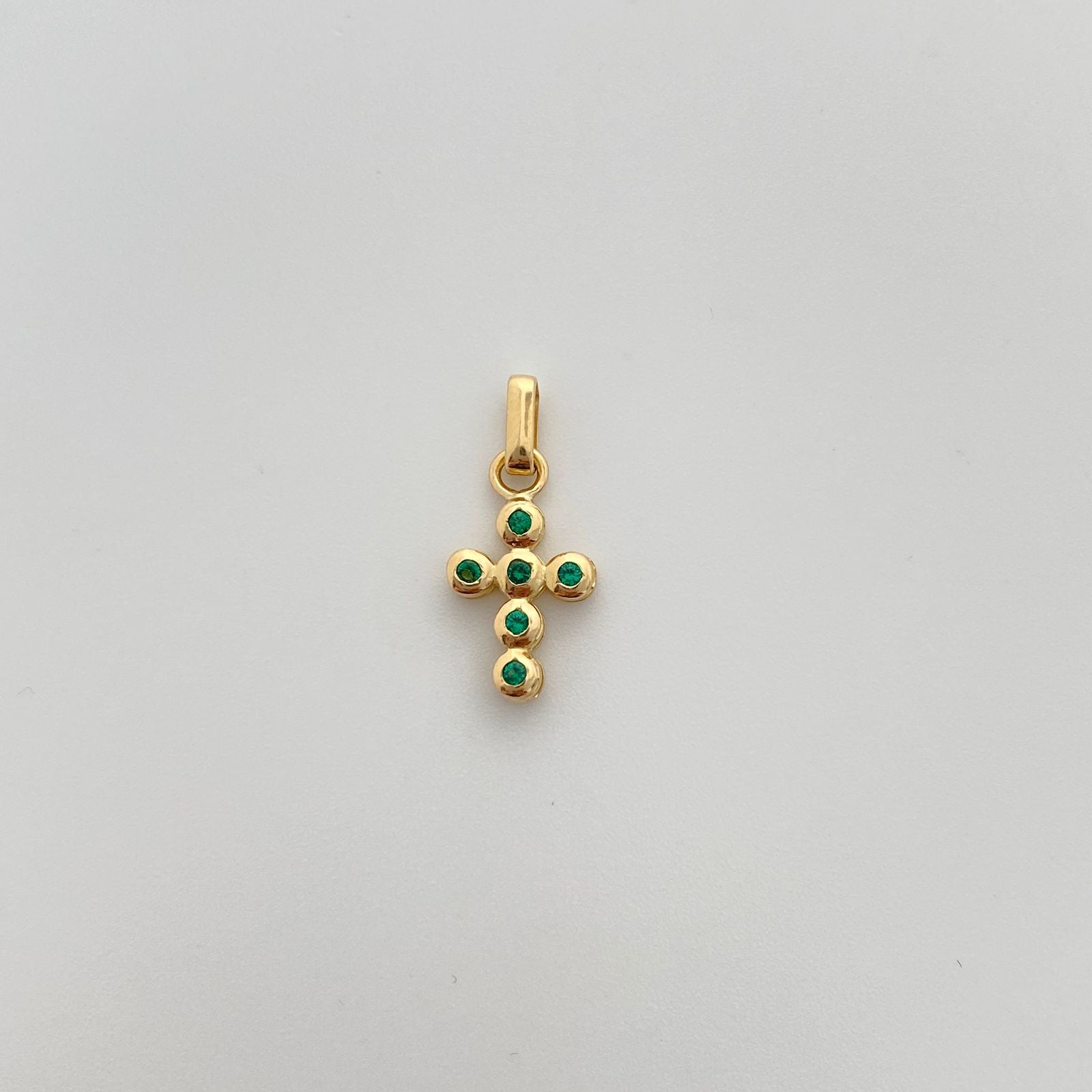 Dije cruz con circones verdes  Oro amarillo 18k 1,1 Gr / 1,4 mm / 2,5 Cm