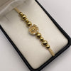 Pulsera tejida Herraje tambor virgen circones blancos bolas lisas 8mm y 6mm Oro amarillo y Oro blanco 18k 5,30 Gr