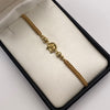 Pulsera tejida Herraje herradura caballo bolas diamantadas 5mm, 4mm y 3mm Oro amarillo 18k 0,90 Gr