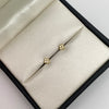 Topos mini flor circones blancos Oro amarillo 18k 0,6 Gr / 4,5 mm