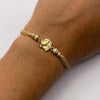 Pulsera tejida Herraje herradura caballo bolas diamantadas 5mm, 4mm y 3mm Oro amarillo 18k 0,90 Gr