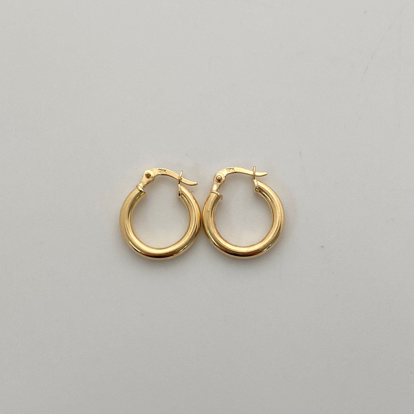 Candonga redonda lisa Oro amarillo 18k 1,20 Gr / 1,5 Cm