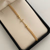 Pulsera tejida Cruz Casting Bolas Diamantadas 5,4mm Oro amarillo 18k 0,9 Gr