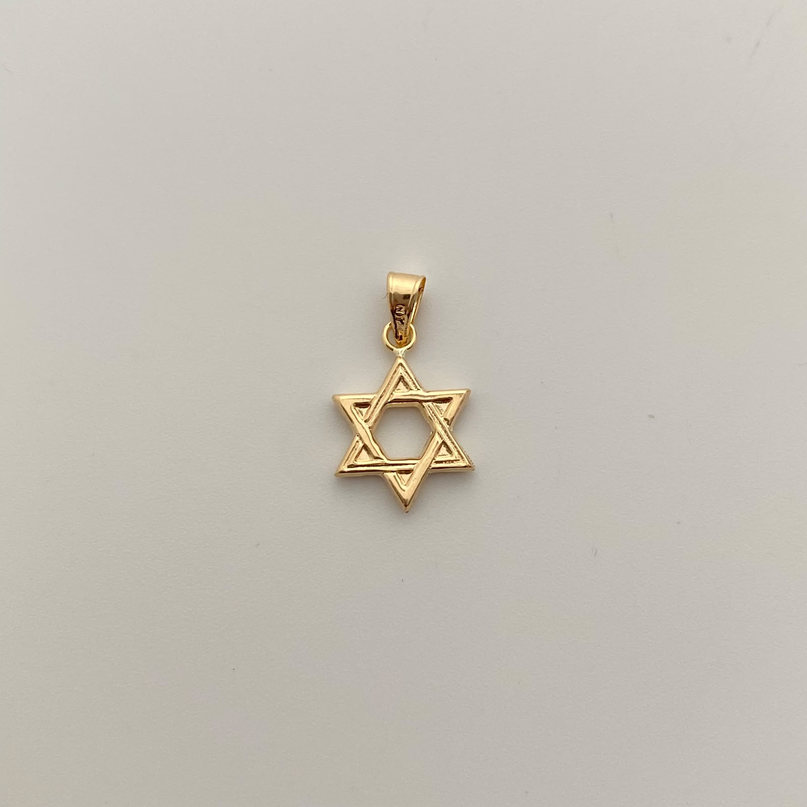 Dije Estrella de David Oro amarillo 18k 0,55 Gr / 11,5 mm / 2 Cm