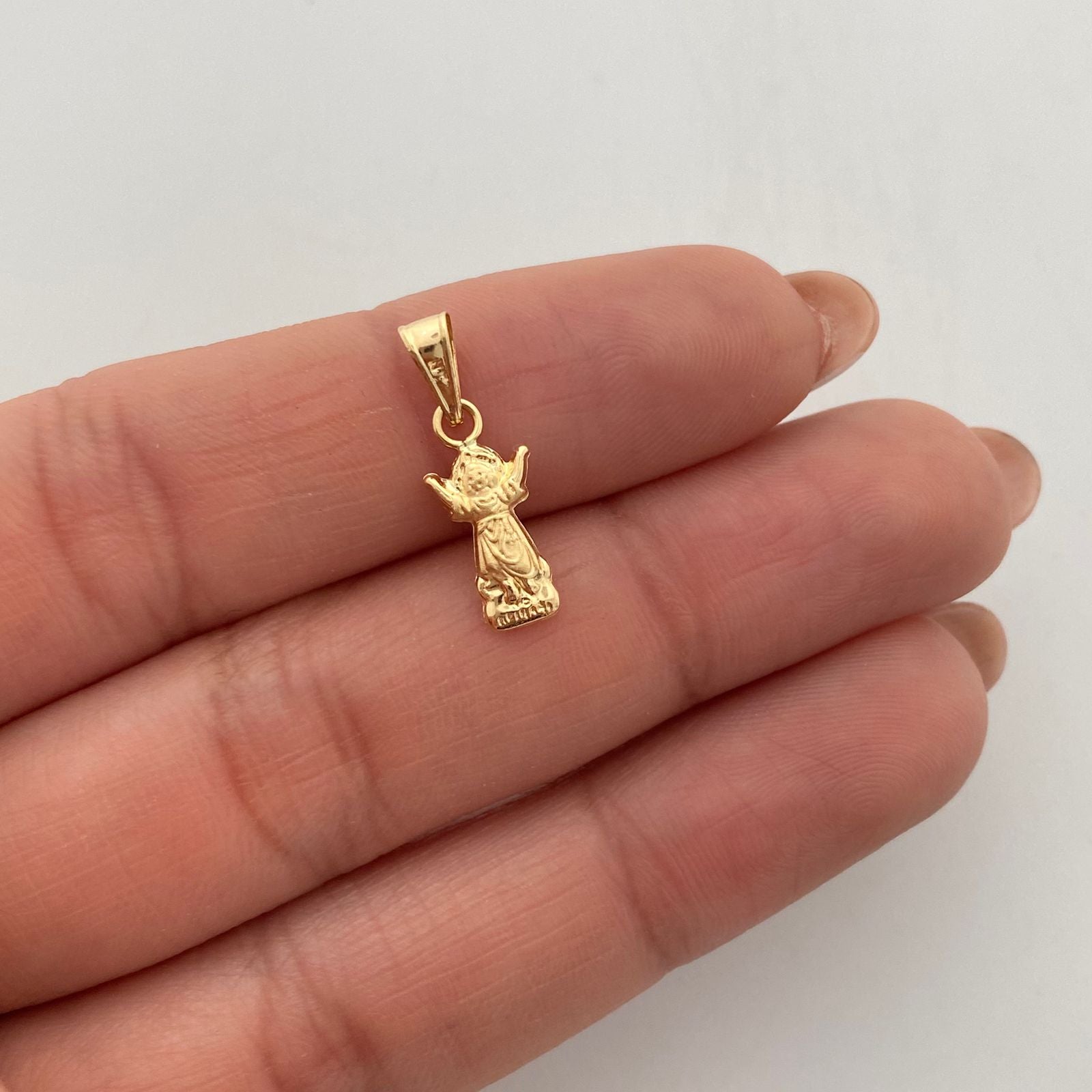 Dije divino niño Oro amarillo 18k 0,35 Gr / 1,8 Cm