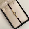 Pulsera tejida pato con balines diamantados 4mm  Tres oros 18k 2 Gr